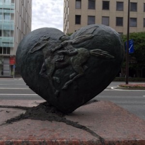 Heart with Pegasus and cracked stone mailbox 